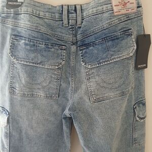 True Religion Light Wash Flare Jeans with Flap Pockets